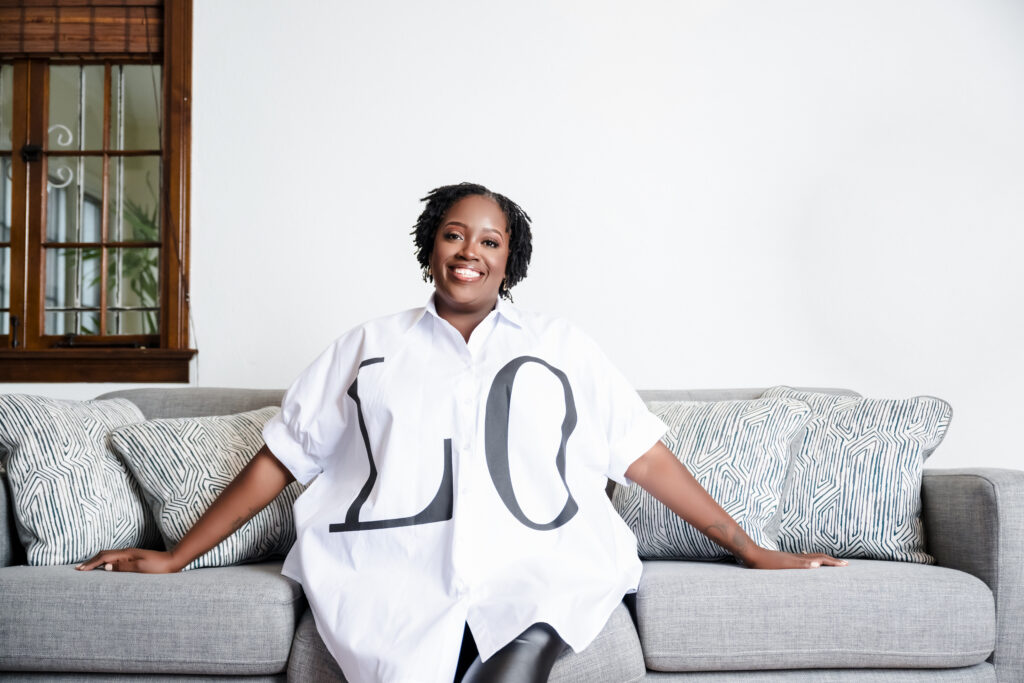 founder sitting on couch smiling